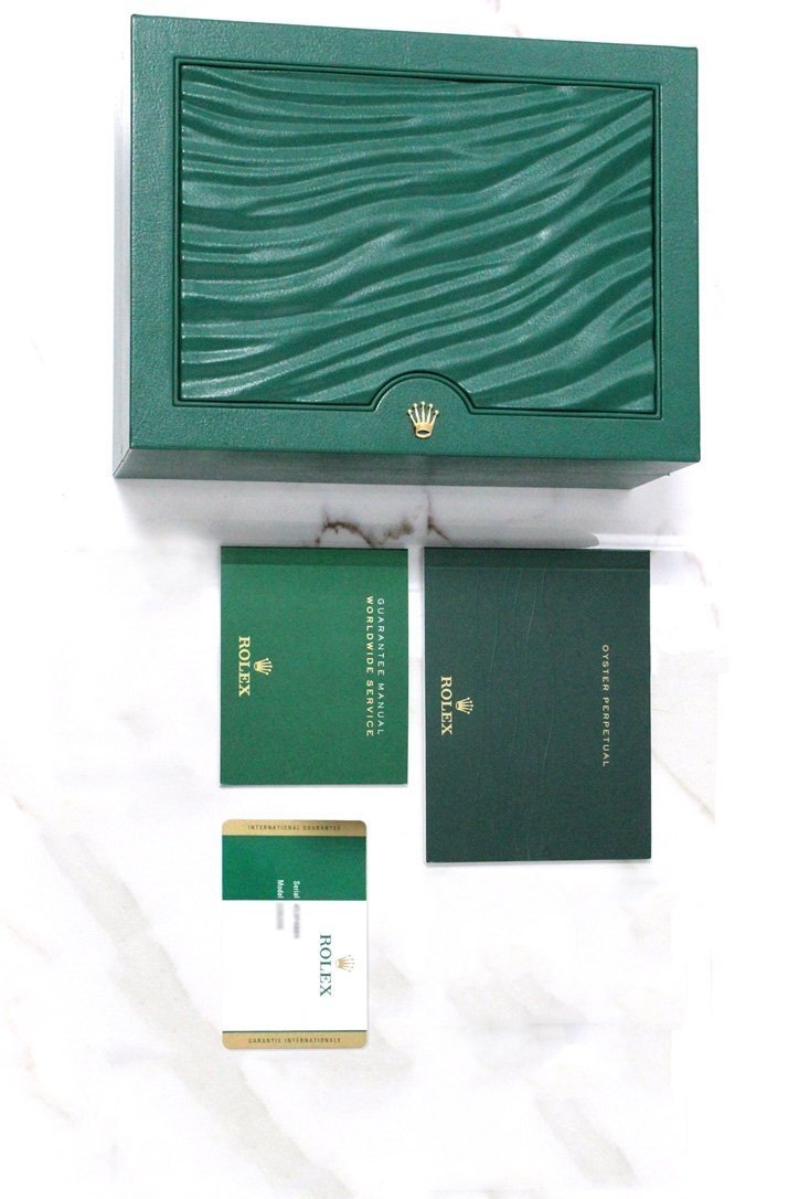 Rolex Day-Date 40 Olive Green Roman Dial Baguette Diamond Bezel Platinum President Automatic Mens