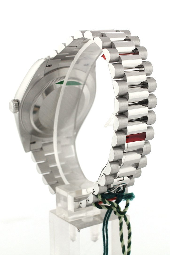 Rolex Day-Date 40 Dark Rhodium Stripe Motif Dial Baguette Diamond Bezel Platinum President Automatic